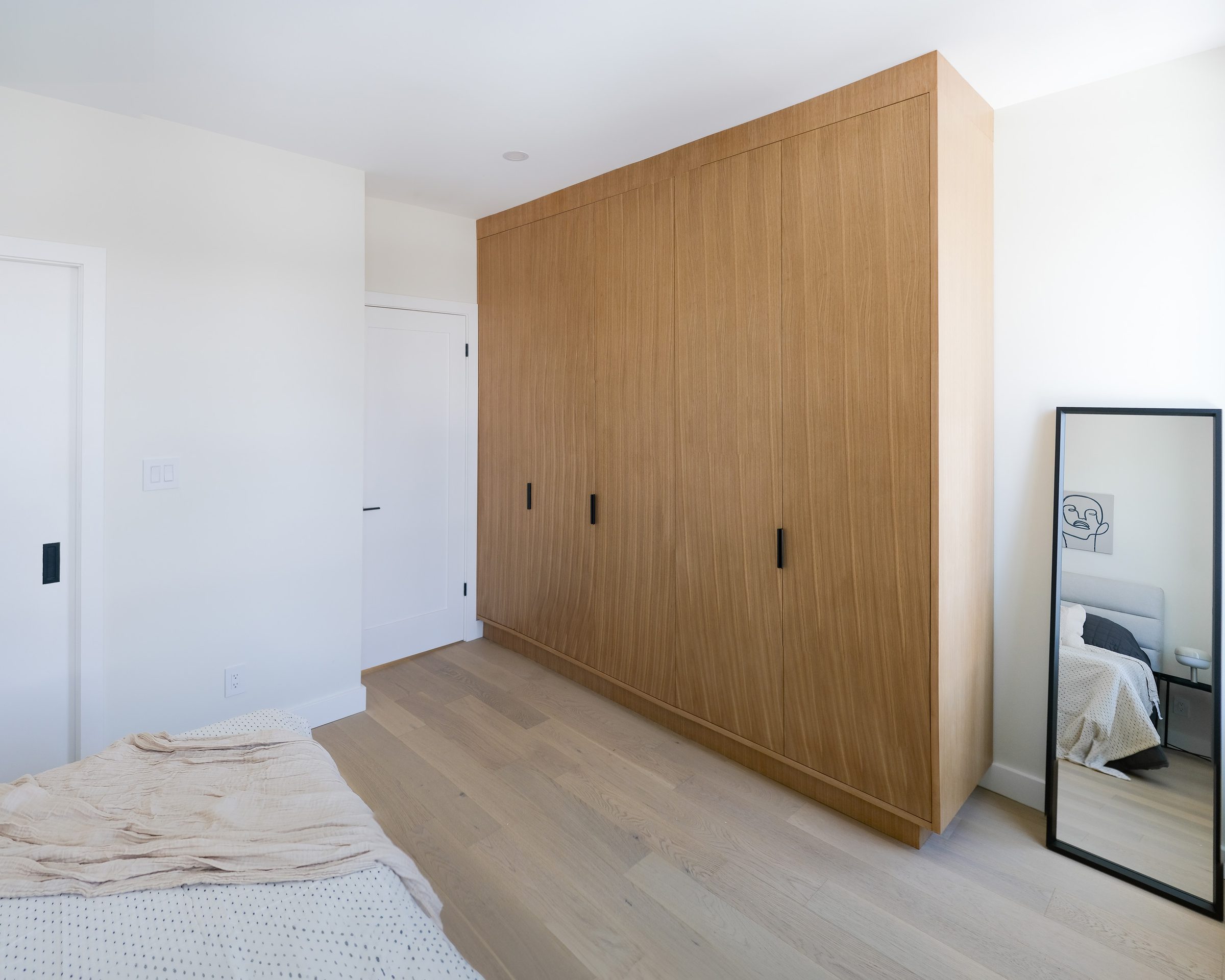 Custom wardrobe and bedroom storage at Junction House, Toronto