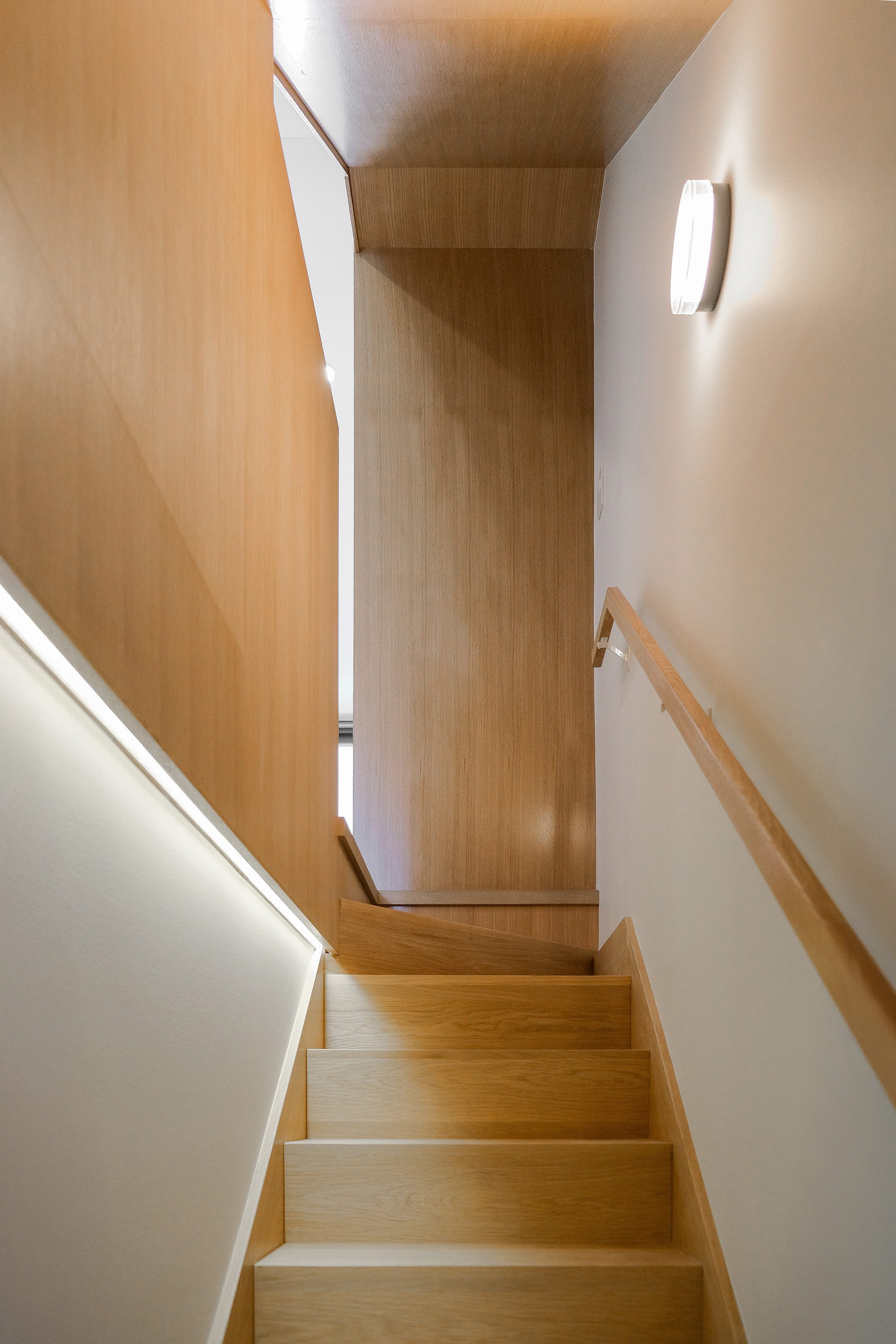 White oak basement staircase at Junction House, Toronto