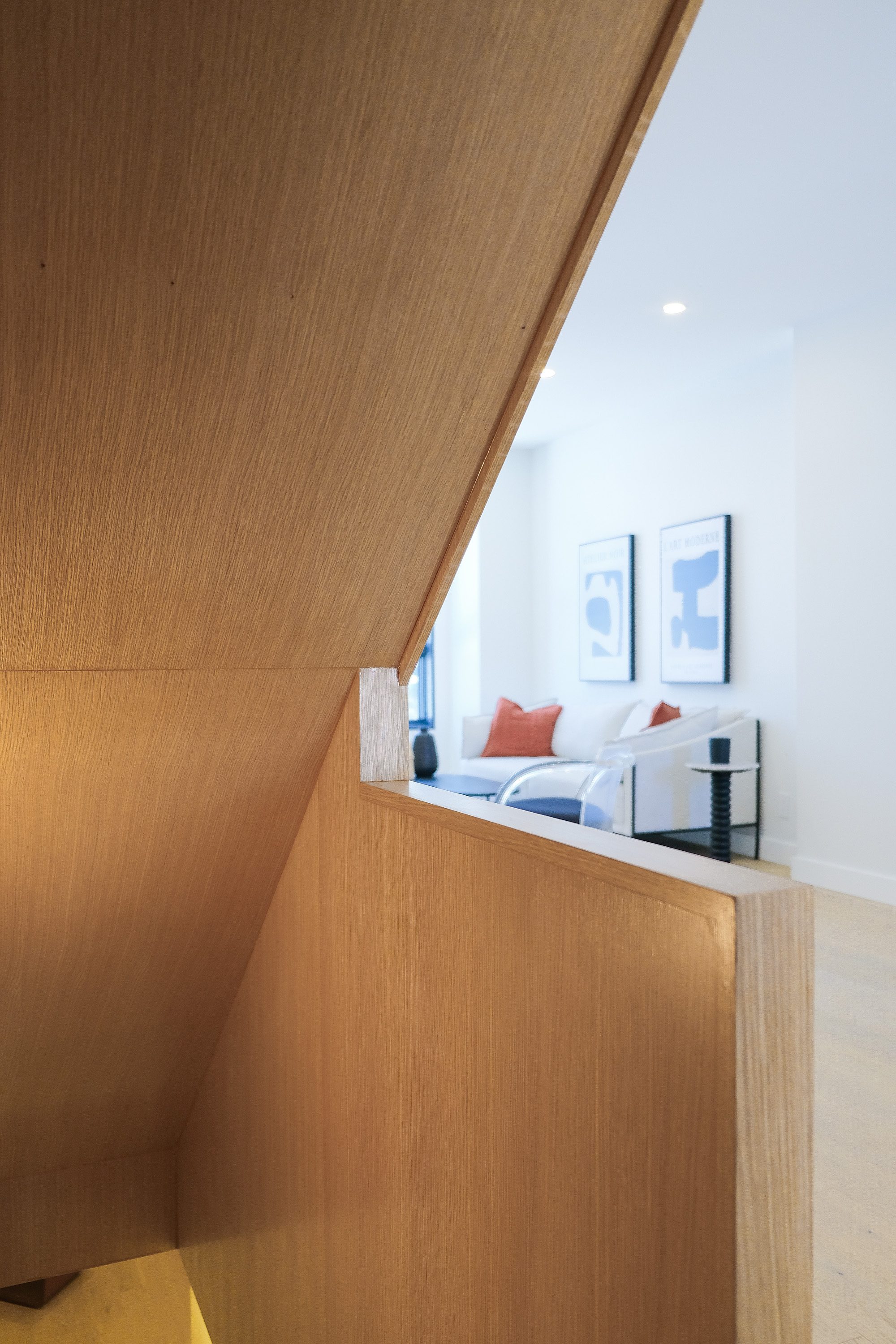 White oak staircase millwork detail at Junction House, Toronto, built by Doty Construction